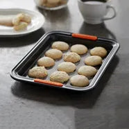 Bakeware with cake tins, loaf tins, and baking trays from Philip Morris & Son