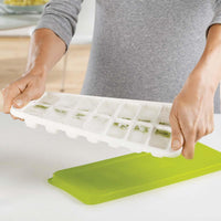 White/Green Joseph Joseph Quicksnap Plus Ice Cube Tray Ice Cubes Being Removed