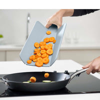 Regular Joseph Joseph Chop2Pot Plus Folding Chopping Board Pale Blue use
