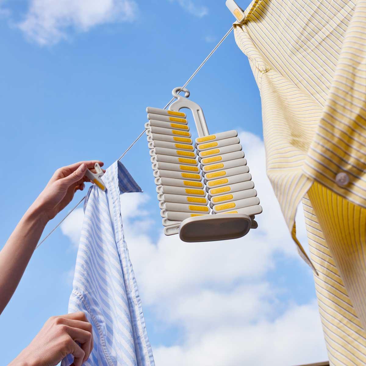 Joseph Joseph PegStore 30-Piece Clothes Peg Set With Storage Stand Lifestyle In Use