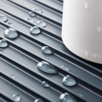 Grey Joseph Joseph Y-rack Dishdrainer water