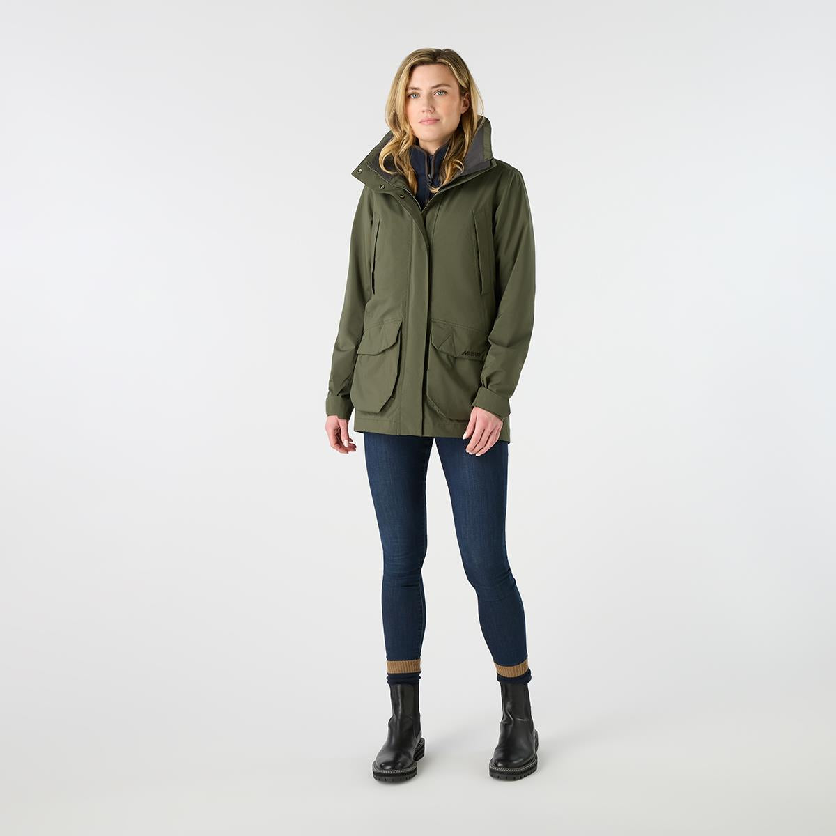 Deep Green Musto Womens Outdoor Country Fenland Stretch Waterproof Coat On Model