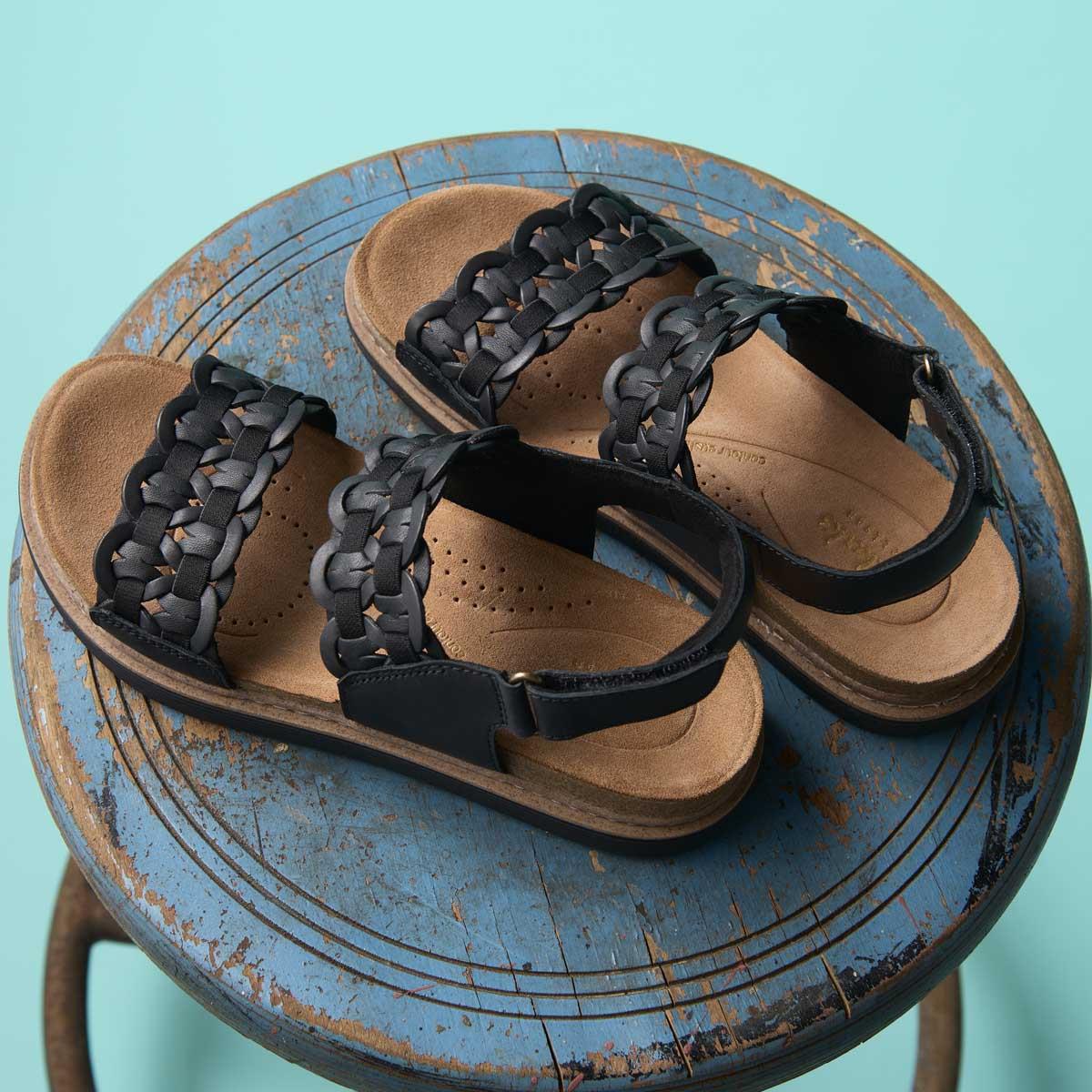 Black Combi Clarks Womens Arwell Glide Sandals On Table