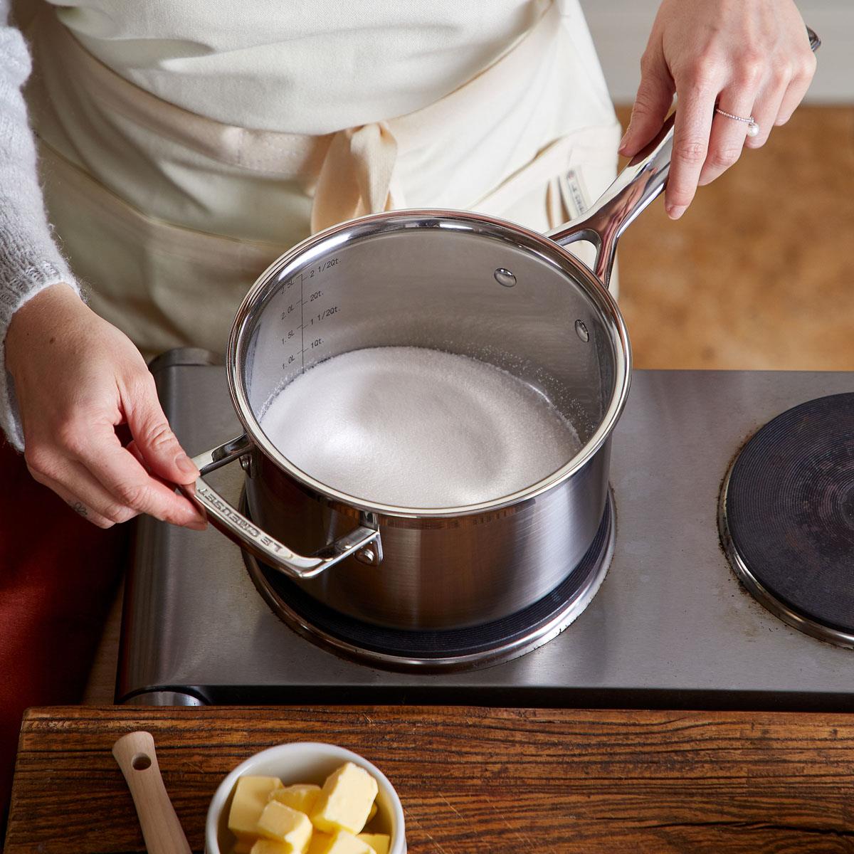 Le Creuset Classic 3-ply Stainless Steel Saucepan with Lid and Helper Handle