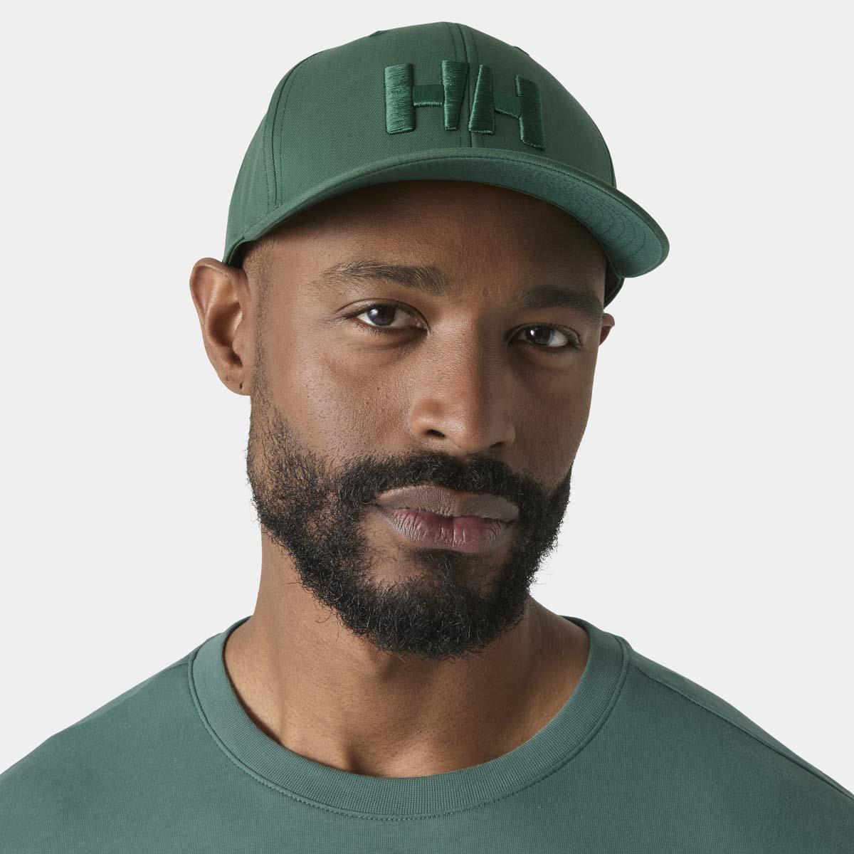 Opal Green Helly Hansen HH Brand Cap on model