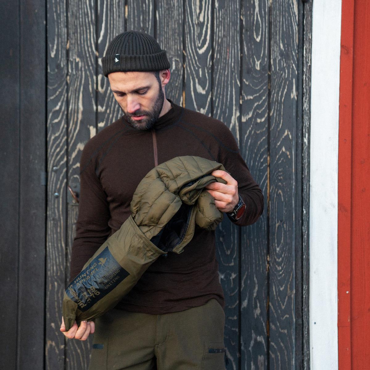 Light Pine Seeland Mens Fahrenheit Jacket Being Packed