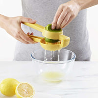 Yellow Joseph Joseph JuiceMax Dual-action Citrus Press bowl2