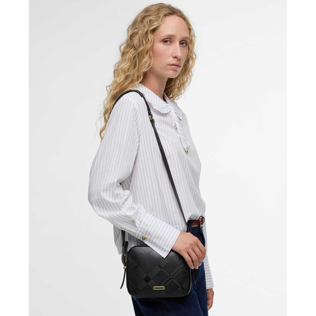 Black/Deboss Tartan Barbour Womens Daphne Deboss Leather Crossbody Bag On Model