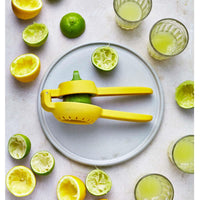 Yellow Joseph Joseph JuiceMax Dual-action Citrus Press limes
