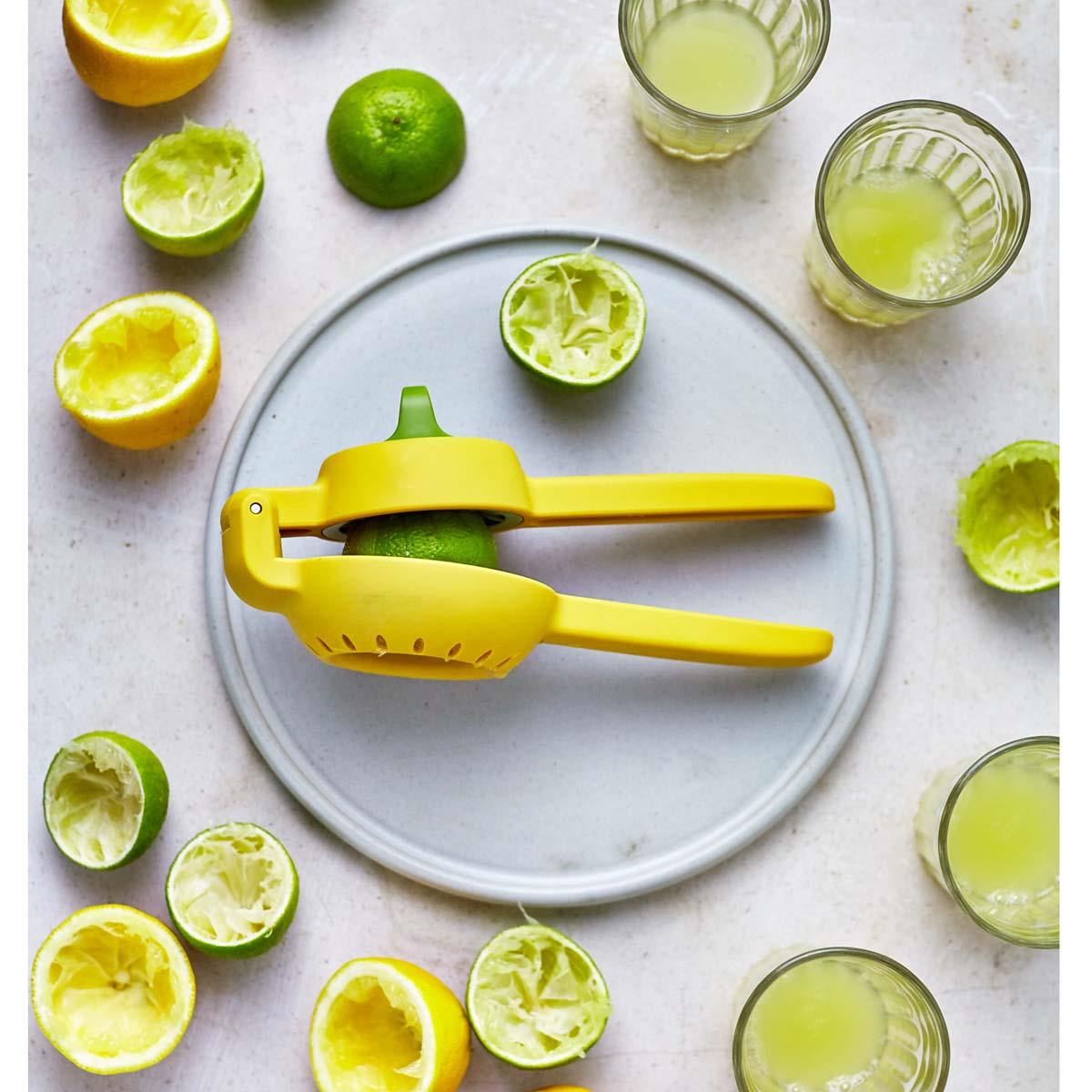 Yellow Joseph Joseph JuiceMax Dual-action Citrus Press limes