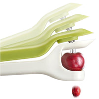 Joseph Joseph Tweezy 2-in-1 Pitter and Huller Pitter In Use