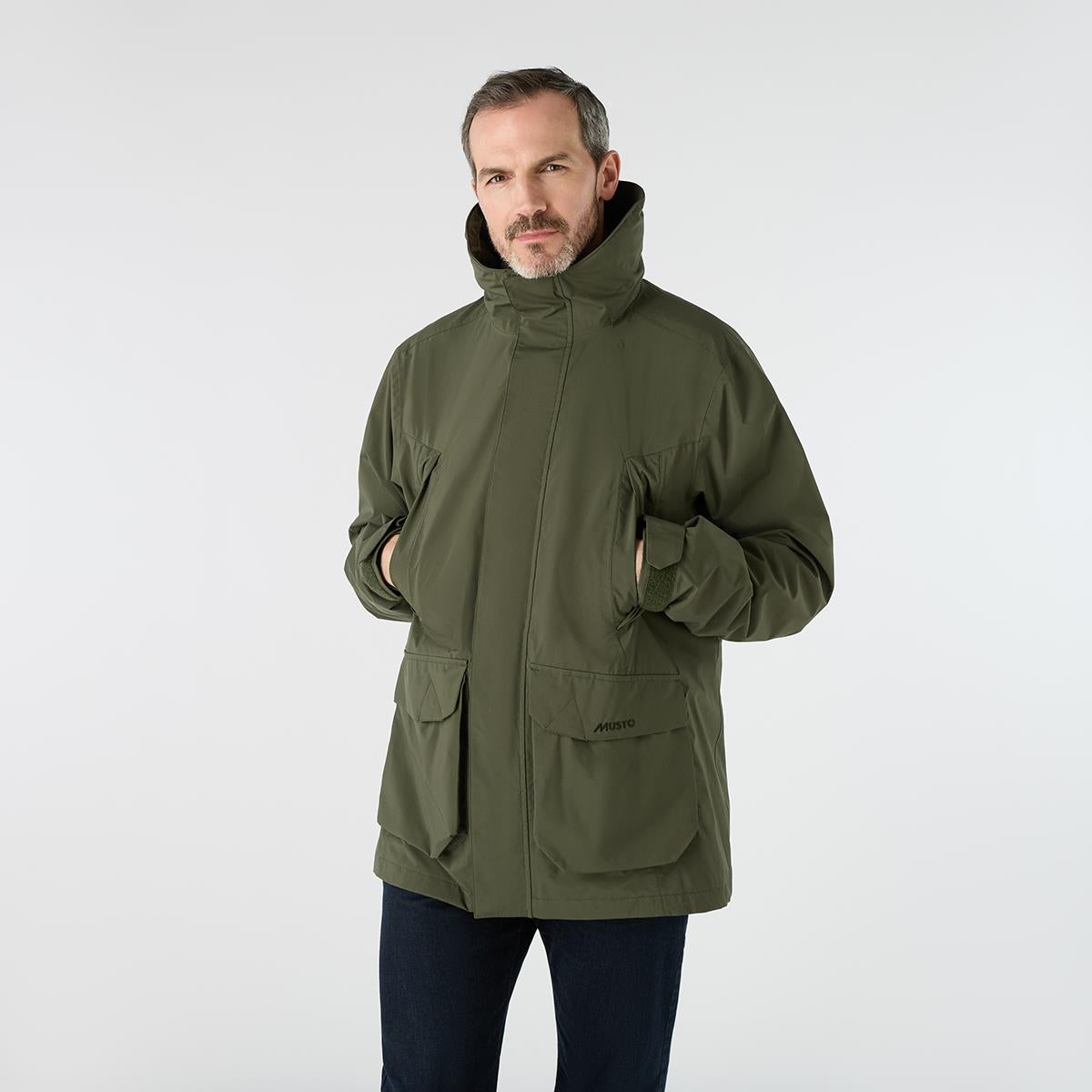 Deep Green Musto Mens Country Fenland Stretch Waterproof Jacket On Model