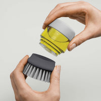 Grey Joseph Joseph Palm Scrub Brush apart