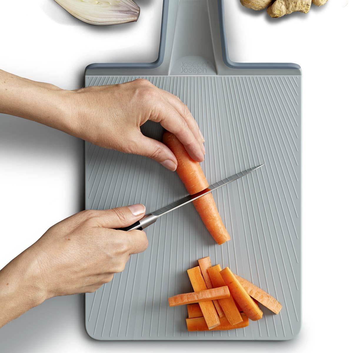 Regular Joseph Joseph Chop2Pot Plus Folding Chopping Board Pale Blue carrot