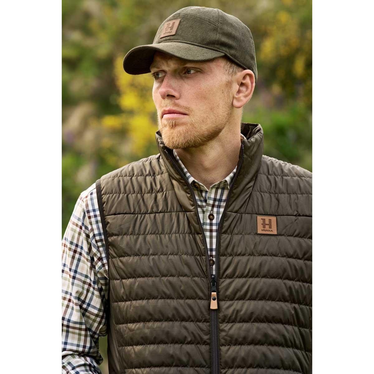 Willow Green/Shadow Brown Harkila Mens Kalix HSP Reversible Waistcoat On Model