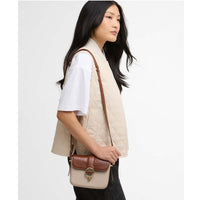 Pebbled Pink/Brown Barbour Mini Rosa Leather Crossbody Bag on model