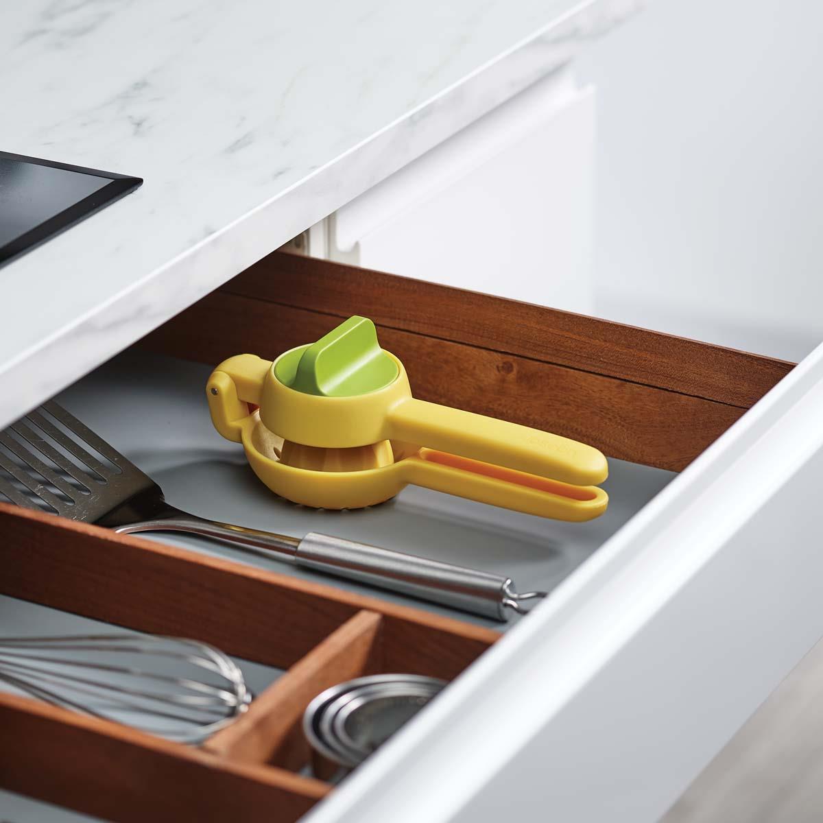 Yellow Joseph Joseph JuiceMax Dual-action Citrus Press storage
