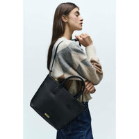Black Barbour Womens Birch Leather Tote Bag On Model Side