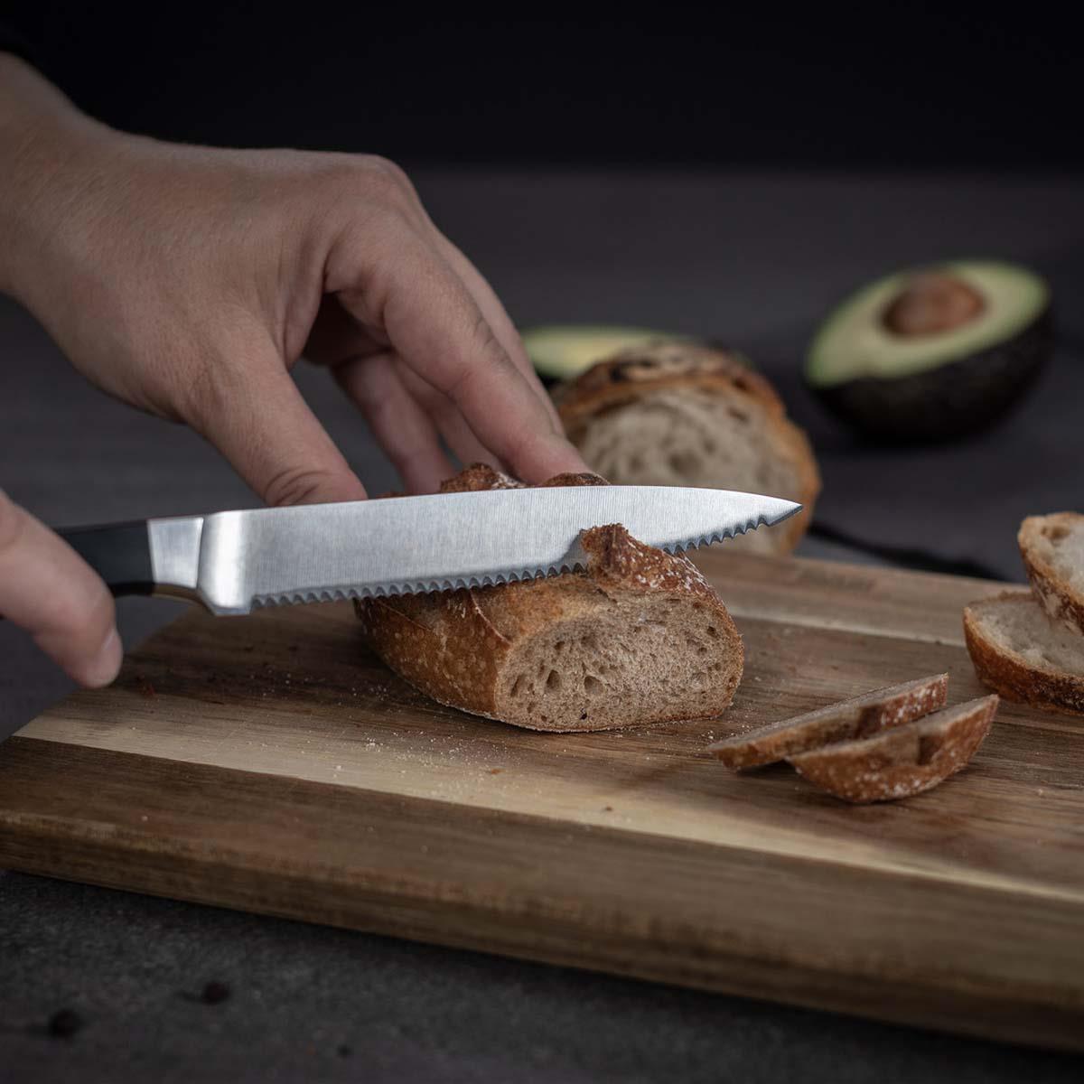 Kuhn Rikon Culinary Forged Utility Knife Serrated In Use
